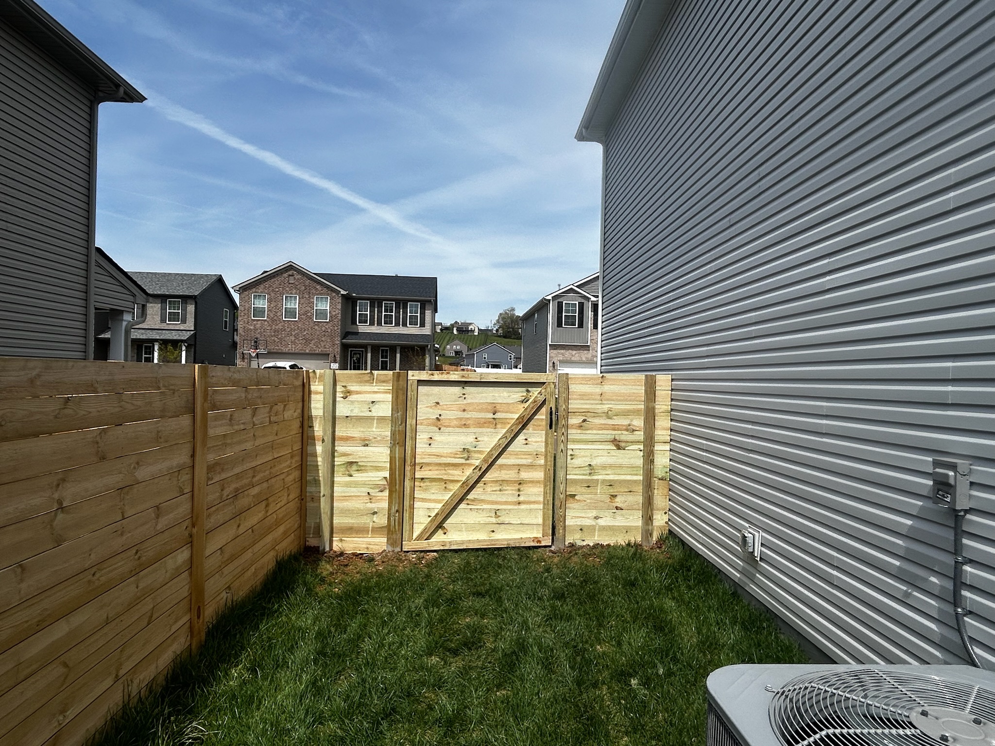 Horizontal wood privacy fence with custom gate, Knoxville TN