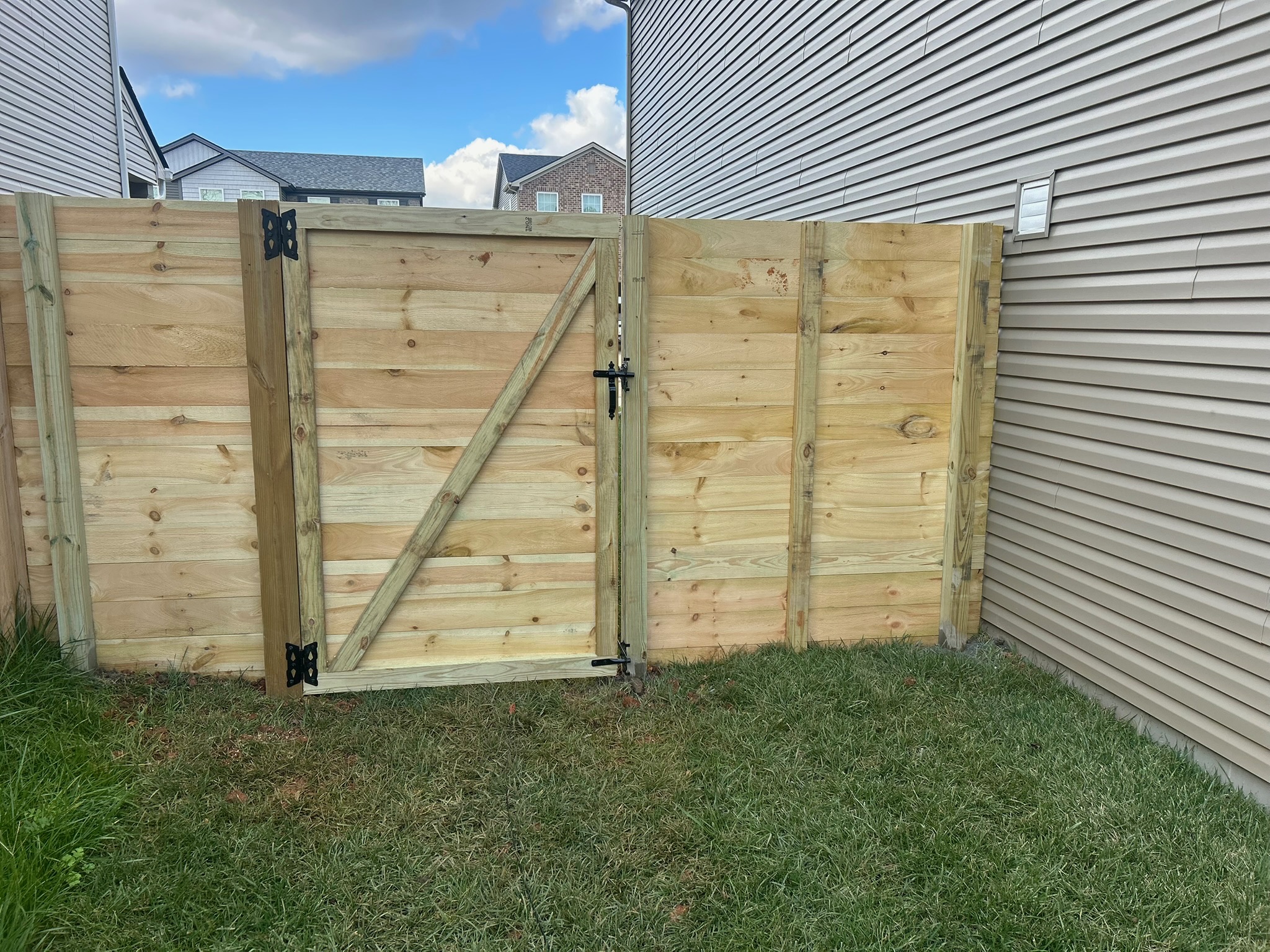 Horizontal board wood privacy fence installation Knoxville Tennessee