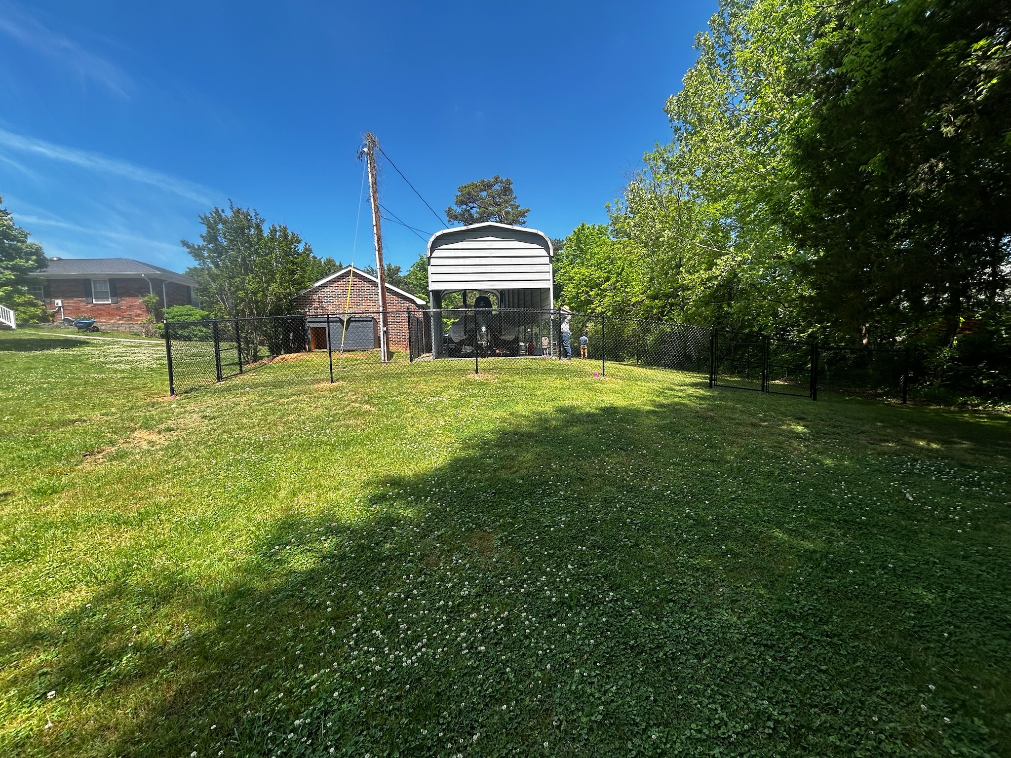 Black vinyl-coated chain link fence installed in Knoxville TN