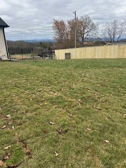 Black aluminum fence installation in Knoxville TN by Titan Fencing TN
